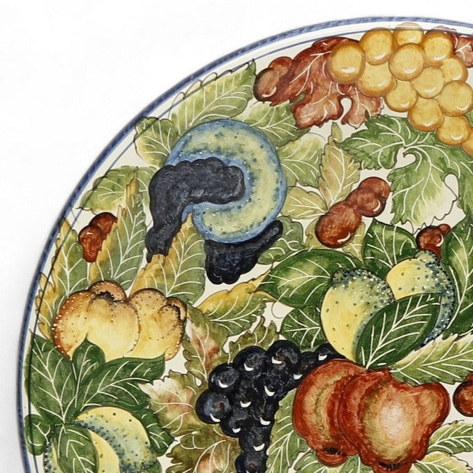 TUSCAN MAJOLICA: Large wall plate featuring assorted fruits and foliage. (22.5" DIAM)